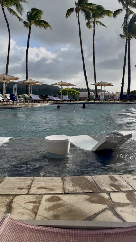 two kids enjoying the pool at The Ritz-Carlton Oahu, Turtle Bay